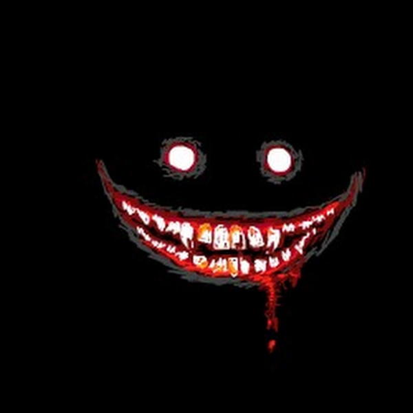 Страшная улыбка на черном фоне